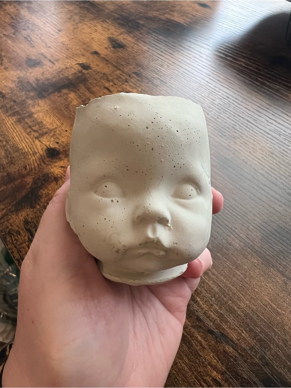 Baby Doll head concrete planter